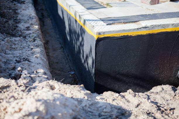 Professional Exterior Waterproofing technician working in Fort Thomas, KY
